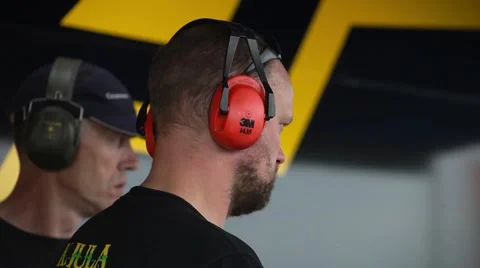 A team of technicians listen to the roar of the engine Stock Footage 59108790