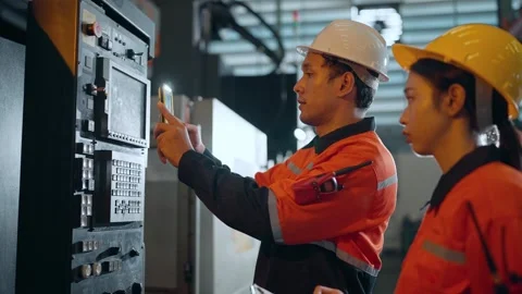 Team of Technicians at Machine Stock Footage 332201451