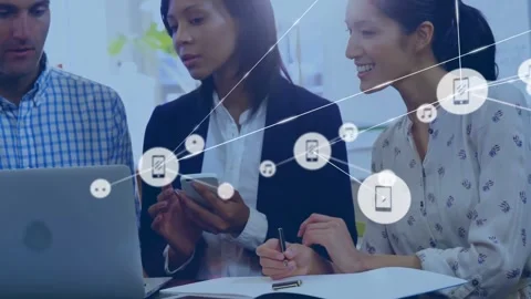 Team of three consulting laptop while center woman tapping phone starting Stock Footage 332275795