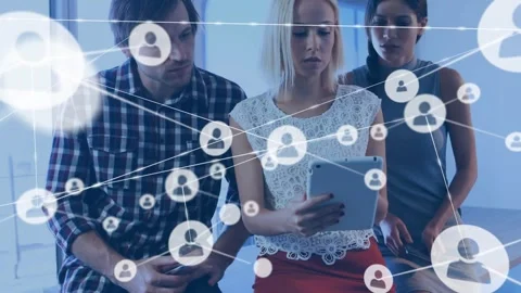 Team of three tapping tablet, sparking icon network growing forward and filling Stock Footage 330980867