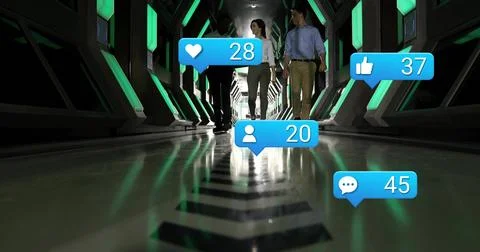 Team of three walking toward camera in tech tunnel, driving animated like or Stock Photos