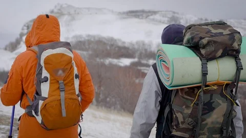 A team of two men go on an expedition. Difficult conditions of the north, each Stock-Footage 106582860