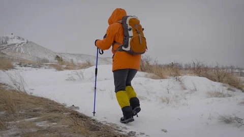 A team of two men go on an expedition. Difficult conditions of the north, each Stock Footage 106582940