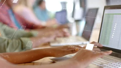 Team typing at laptops, typing sparking code overlays over hands and screen Stock Footage 333774622