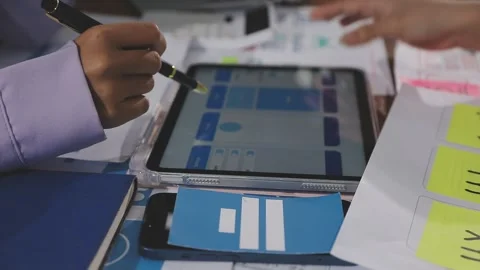 Team of UI UX web designer are working together to develop mobile responsiv.. Stock Footage 310534471
