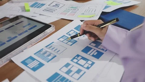 Team of UI UX web designer are working together to develop mobile responsiv.. Stock Footage 310534574