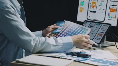Team of UI UX web designer are working together to develop mobile responsiv.. Stock Footage 312243703