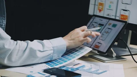 Team of UI UX web designer are working together to develop mobile responsiv.. Stock Footage 312243708