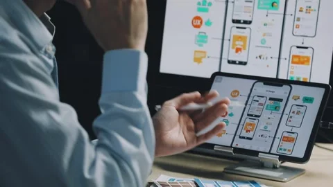 Team of UI UX web designer are working together to develop mobile responsiv.. Stock Footage 312243711