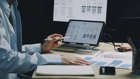 Team of UI UX web designer are working together to develop mobile responsiv.. Stock Footage 312243713