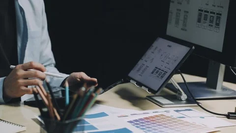 Team of UI UX web designer are working together to develop mobile responsiv.. Stock Footage 312243715