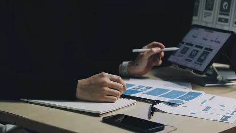 Team of UI UX web designer are working together to develop mobile responsiv.. Stock Footage 312243723