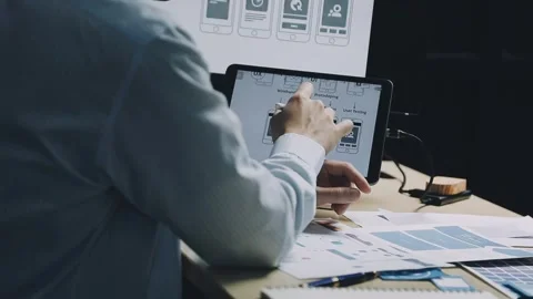 Team of UI UX web designer are working together to develop mobile responsiv.. Stock Footage 312243727