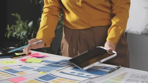 Team of UI UX web designer are working together to develop mobile responsiv.. Stock Footage 313584268