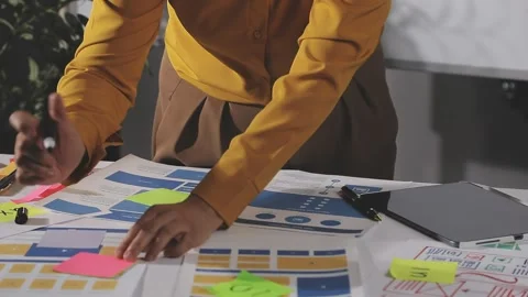 Team of UI UX web designer are working together to develop mobile responsiv.. Stock Footage 313584297
