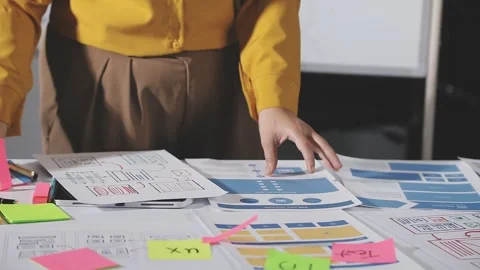 Team of UI UX web designer are working together to develop mobile responsiv.. Stock Footage 313584423