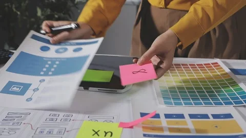 Team of UI UX web designer are working together to develop mobile responsiv.. Stock Footage 313584466