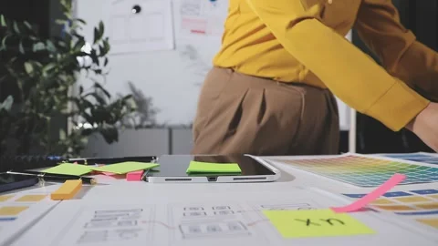 Team of UI UX web designer are working together to develop mobile responsiv.. Stock Footage 313584478