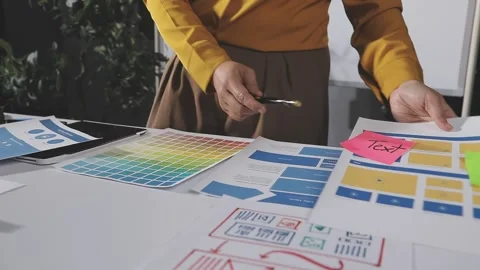 Team of UI UX web designer are working together to develop mobile responsiv.. Stock Footage 313584485