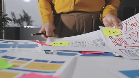 Team of UI UX web designer are working together to develop mobile responsiv.. Stock Footage 313584529