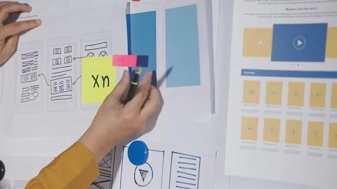 Team of UI UX web designer are working together to develop mobile responsiv.. Stock Footage 313584606