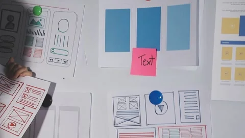 Team of UI UX web designer are working together to develop mobile responsiv.. Stock Footage 313584652