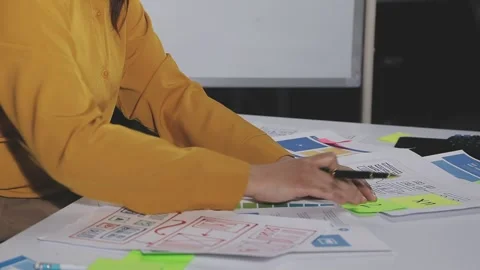 Team of UI UX web designer are working together to develop mobile responsiv.. Stock Footage 313584830