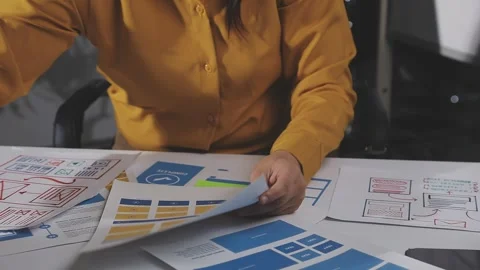 Team of UI UX web designer are working together to develop mobile responsiv.. Stock Footage 313584869