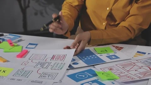 Team of UI UX web designer are working together to develop mobile responsiv.. Stock Footage 313584968