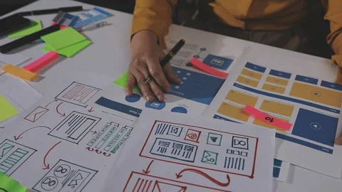 Team of UI UX web designer are working together to develop mobile responsiv.. Stock Footage 313585033