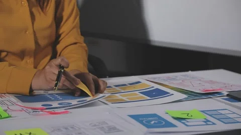Team of UI UX web designer are working together to develop mobile responsiv.. Stock Footage 313585214