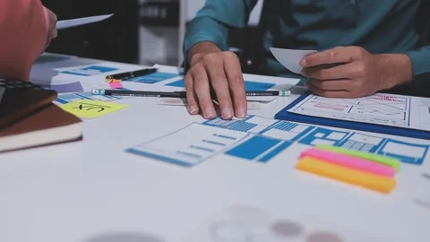 Team of UI UX web designer are working together to develop mobile responsiv.. Stock Footage 326302941