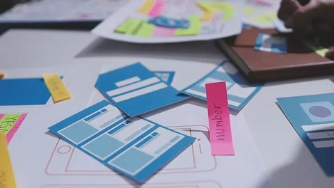 Team of UI UX web designer are working together to develop mobile responsiv.. Stock Footage 326303711