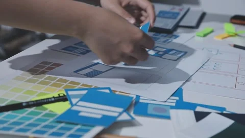 Team of UI UX web designer are working together to develop mobile responsiv.. Stock Footage 328847592