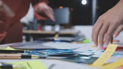 Team of UI UX web designer are working together to develop mobile responsiv.. Stock Footage 328847595