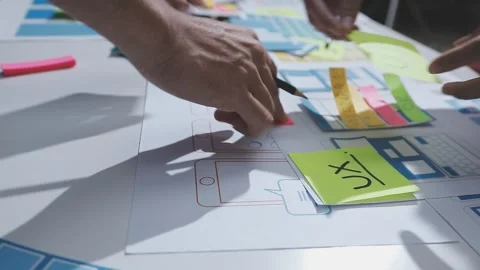 Team of UI UX web designer are working together to develop mobile responsiv.. Stock Footage 328847798