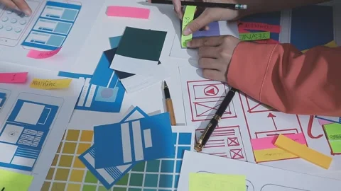 Team of UI UX web designer are working together to develop mobile responsiv.. Stock Footage 328847865