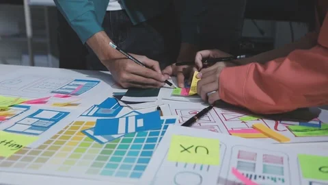 Team of UI UX web designer are working together to develop mobile responsiv.. Stock Footage 328847899