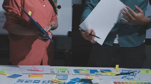 Team of UI UX web designer are working together to develop mobile responsiv.. Stock Footage 328848201