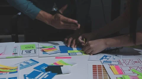 Team of UI UX web designer are working together to develop mobile responsiv.. Stock Footage 328848226