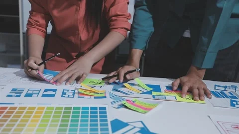 Team of UI UX web designer are working together to develop mobile responsiv.. Stock Footage 328848283