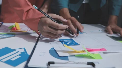 Team of UI UX web designer are working together to develop mobile responsiv.. Stock Footage 328848729