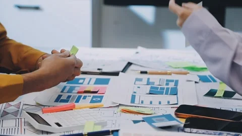 Team of UI UX web designer are working together to develop mobile responsiv.. Stock Footage 330333815