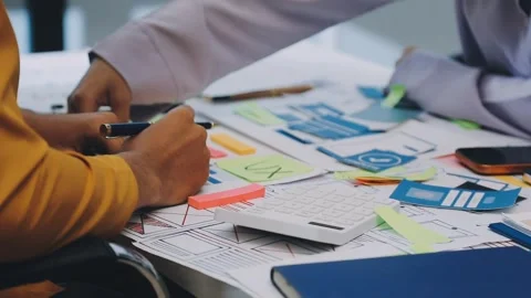 Team of UI UX web designer are working together to develop mobile responsiv.. Stock Footage 330333816