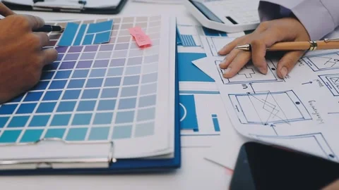 Team of UI UX web designer are working together to develop mobile responsiv.. Stock Footage 330333849