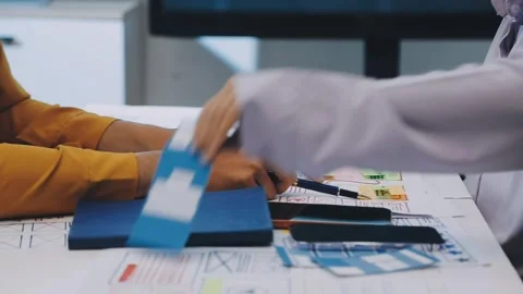 Team of UI UX web designer are working together to develop mobile responsiv.. Stock Footage 330333859