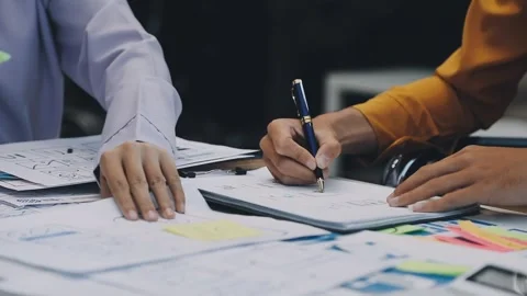 Team of UI UX web designer are working together to develop mobile responsiv.. Stock Footage 330333889