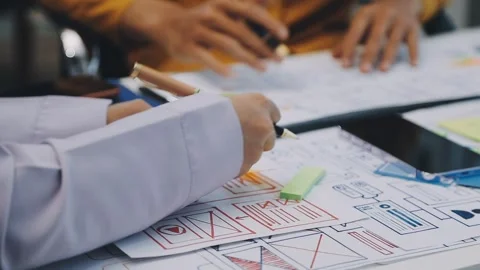 Team of UI UX web designer are working together to develop mobile responsiv.. Stock Footage 330333892