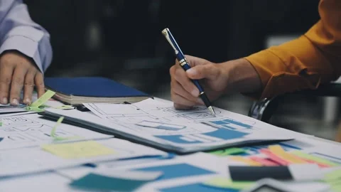 Team of UI UX web designer are working together to develop mobile responsiv.. Stock Footage 330333904