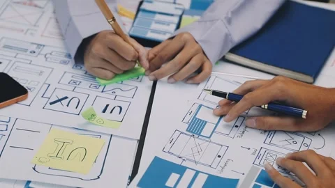 Team of UI UX web designer are working together to develop mobile responsiv.. Stock Footage 330333908